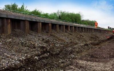 Westbury Station 010 - enhanced sheet piling supporting an embankment alongside a railway line