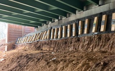 Case Study - I-278 Bridge Rehabilitation 07 Wooden sleepers and metal load plates connected to platipus anchors underneath a highway bridge