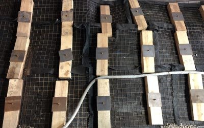 Case Study - I-278 Bridge Rehabilitation 14 wooden sleepers and metal load plates connected to Platipus Anchors