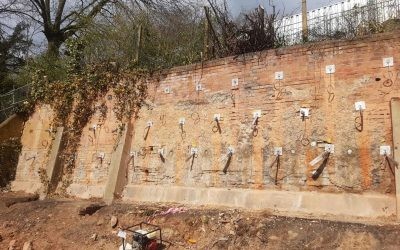 Rear 05 retaining wall with anchor plates and plati-drain visible