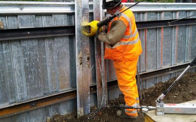 7.Anchor tensioining Worker load locking an earth anchor through sheet piling