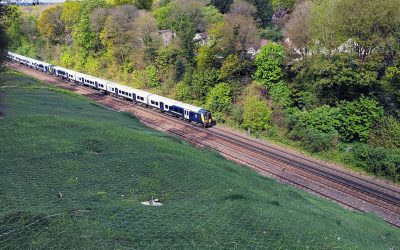 Farnborugh Cutting - Phase ii - 26 train passing through cutting with erosion control matting