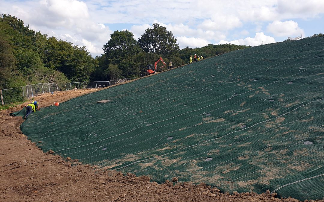 Geosynthetic matting on slope to prevent erosion