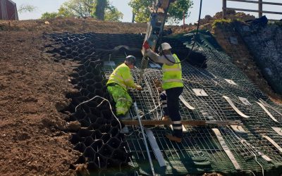 Vantage Copse, Southampton - 02 Workers installing earth anchors on a slope