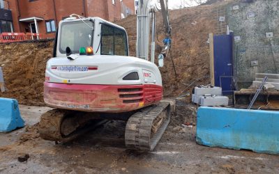 Vantage Copse, Southampton - 20 Small excavator installing earth anchors on a slope