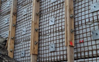 A7, Berthouly (5) Timber soldiers and wire mesh supporting engineered soil along the side of a motor bridge