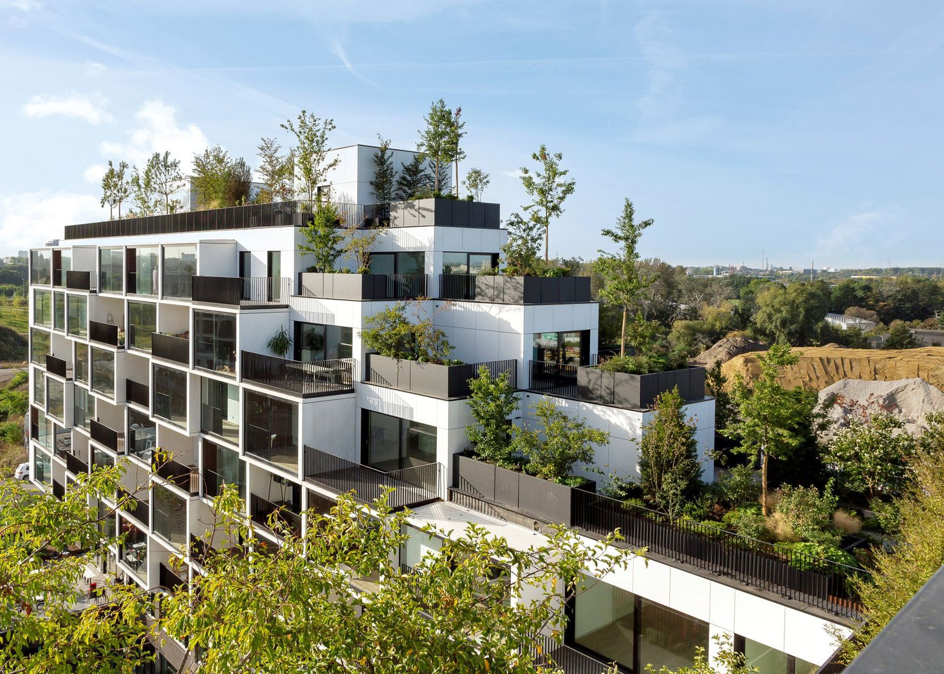 palazzo-verde-stefano-boeri-architetti-antwerp-belgium-architecture-residential_dezeen_1704_col_7 Eco-friendly residential building with tiered design and rooftop greenery in Antwerp, Belgium, designed by Stefano Boeri Architetti.