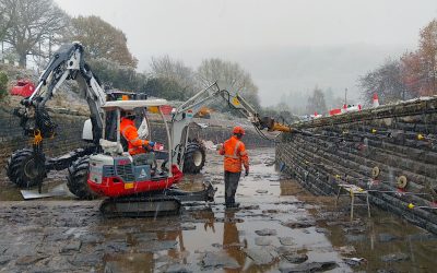 Tallybony Spillway, South Wales - Installation_02 - Enhanced Platipus Earth anchor being driven on historic retaining wall
